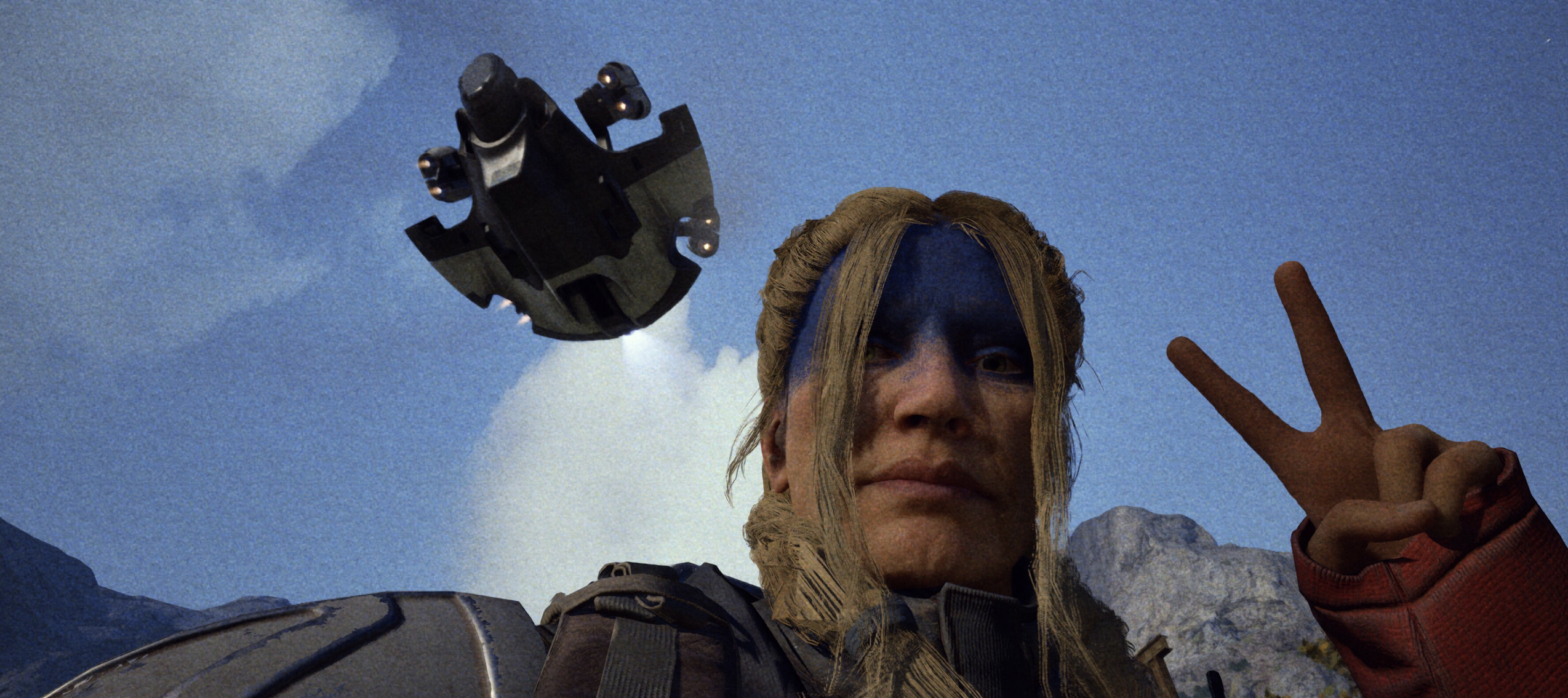 Raider portrait with a drone overhead and a peace sign